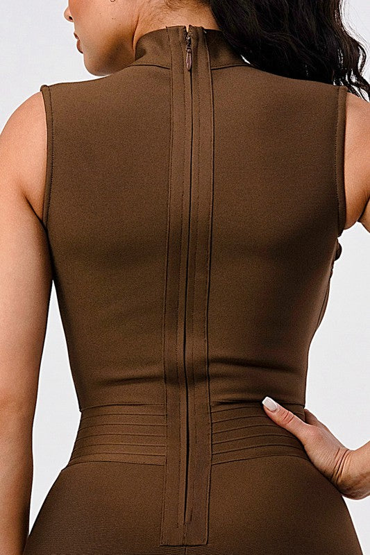 close up back view of model wearing Sexy Brown Criss Cross Detail Bandage Romper