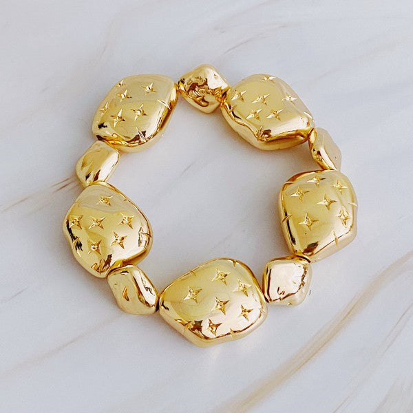 Gold pebble stretch bracelet with starlight design