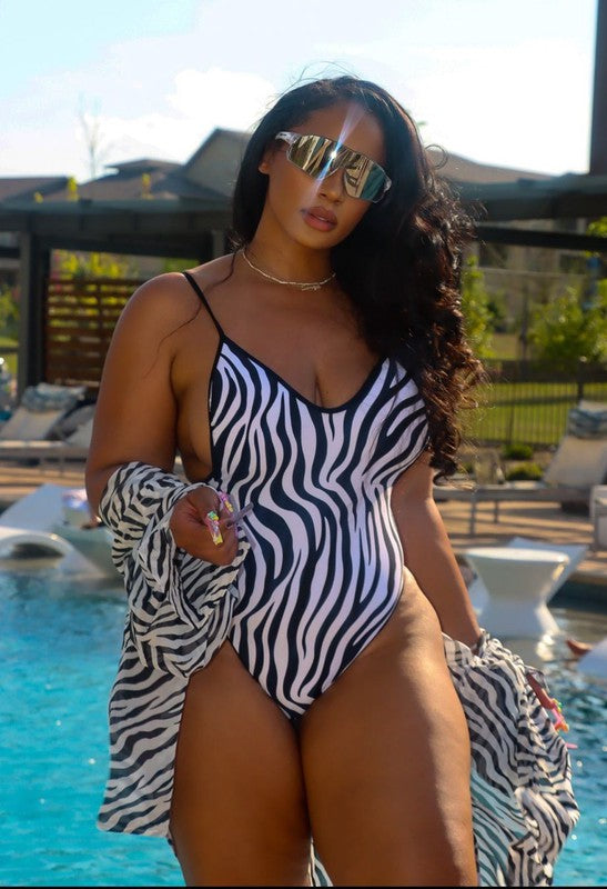 Black One-Piece Zebra Print Swimsuit on model by the pool