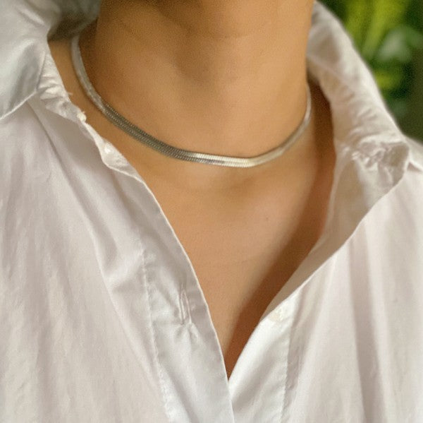 model wearing silver Herringbone Chain Necklace