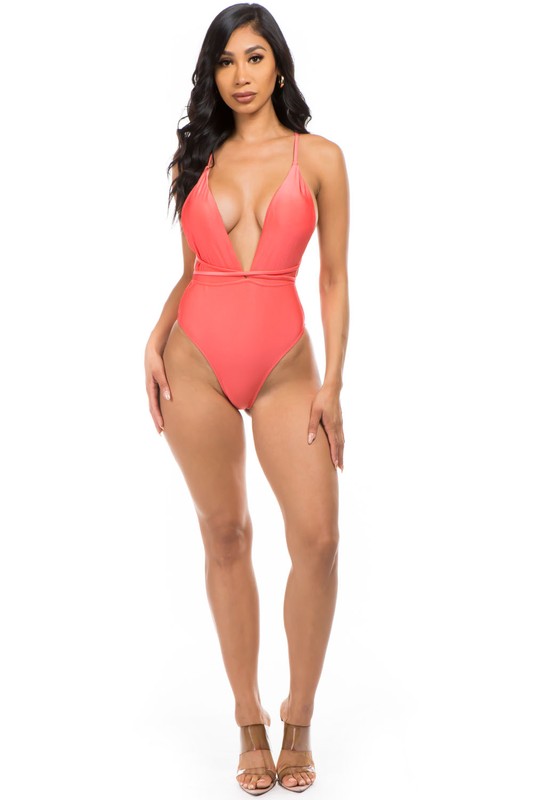 model wearing pink Low V-Neck One Piece Swimsuit