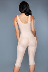 Nude body shaper with removable chest strap and flattering fit for a sculpted look back view