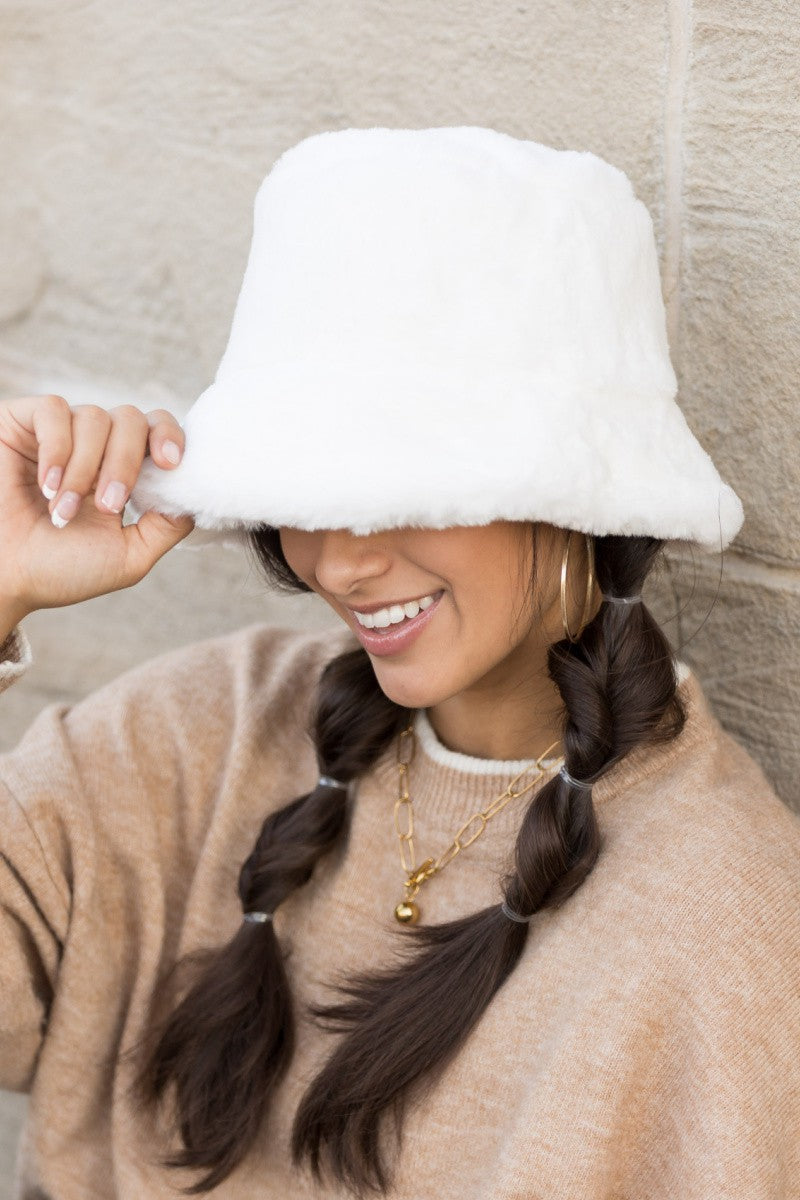 faux fur bucket hat in cream