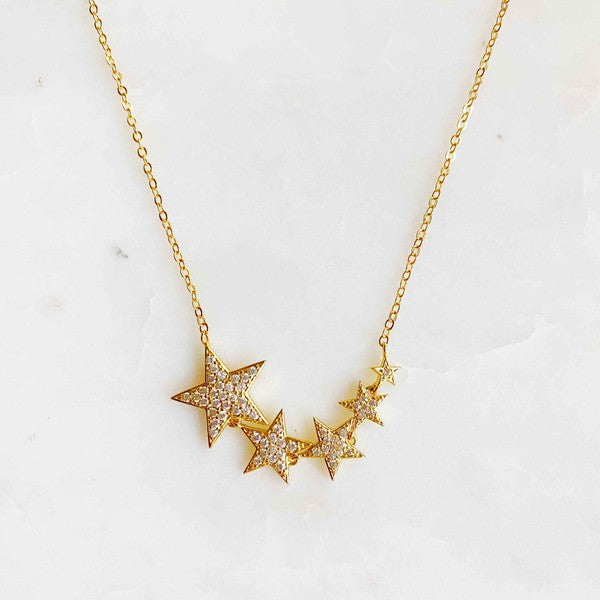 gold necklace with 5 different color stars hanging from it