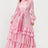 Pink flowy tiered maxi dress with self tie waist belt