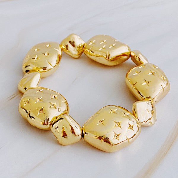 golden bracelet with starlight design