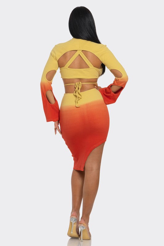 back view of model wearing Yellow and orange gradient high collar skirt set with asymmetrical skirt