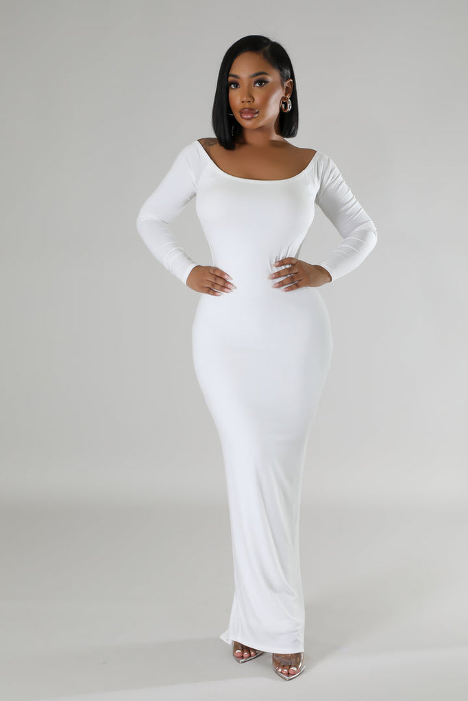 Model wearing White Long Sleeves Open Back Midi Dress with hands on her hips