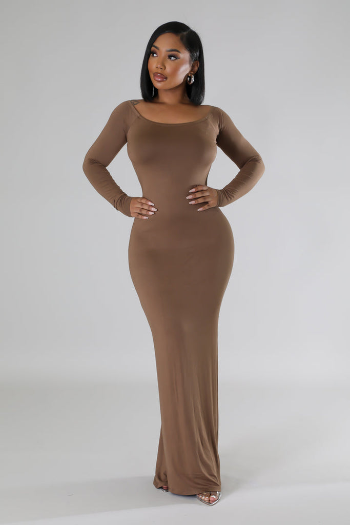 front view of model wearing Brown Long Sleeves Open Back Midi Dress with hands on her hips