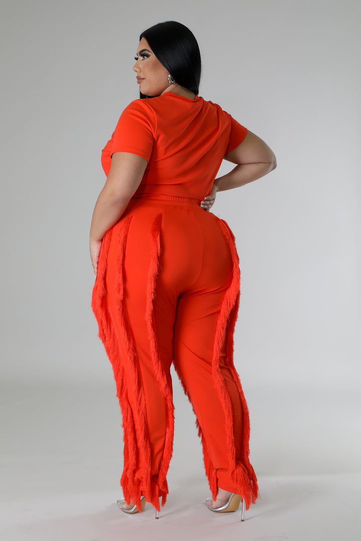 Plus Size model wearing orange High-Waist Pant Set side view