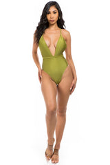 full body view of model wearing olive Low V-Neck One Piece Swimsuit