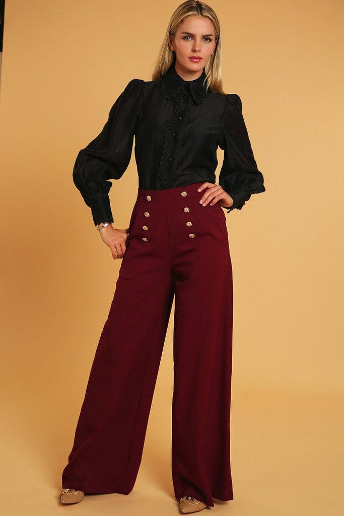 model wearing High Waisted Wide Leg Dress Pants and a long sleeve black blouse