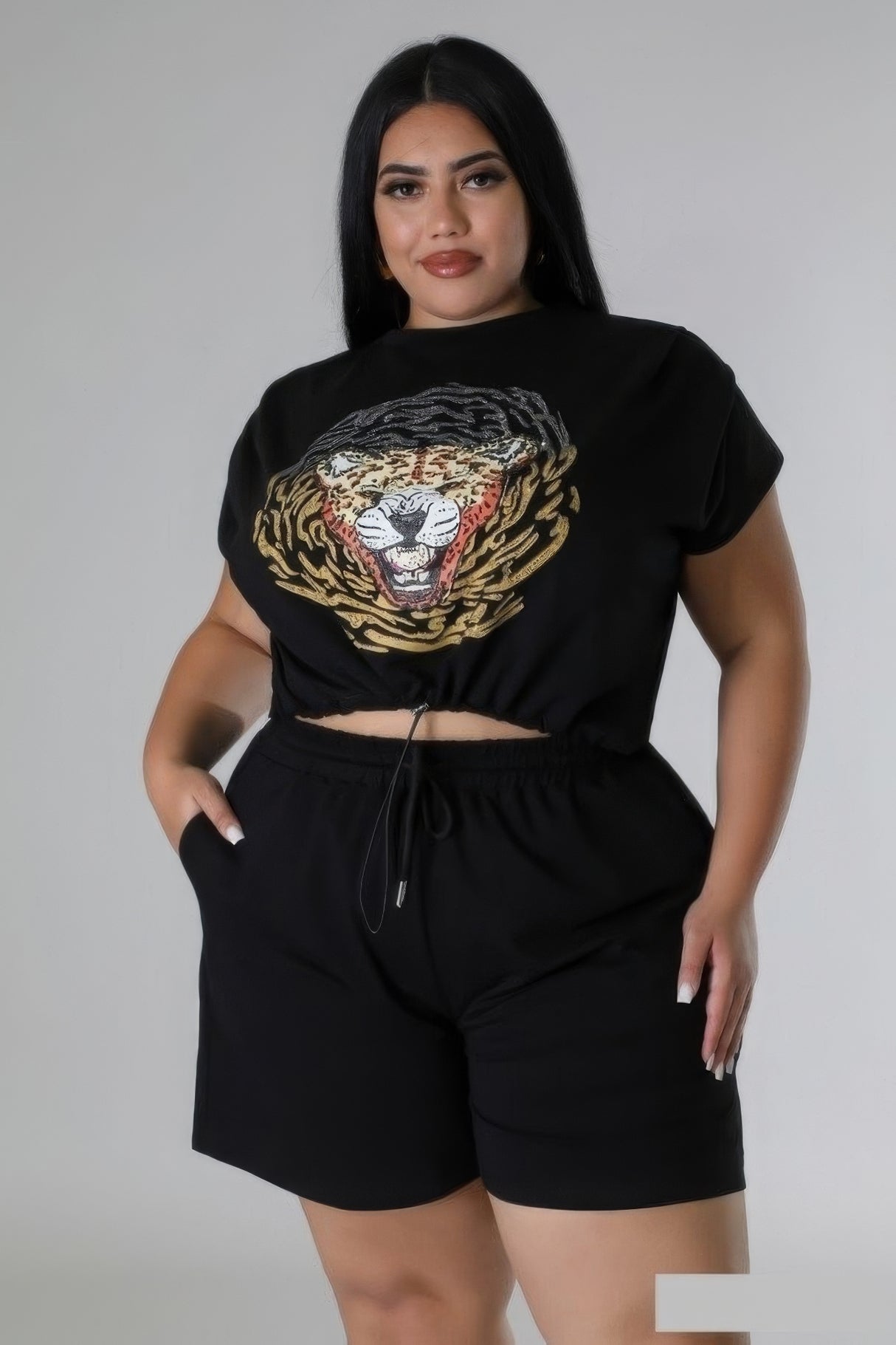 model wearing Black Plus Size High Waisted Short Set white rhinestone graphic design