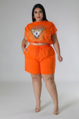 model wearing orange Plus Size High Waisted Short Set