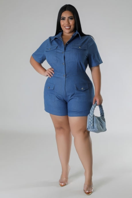 Plus Size Semi-Stretch Denim Romper full body view with model holding light blue purse