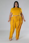 Plus Size model wearing yellow High-Waist Pant Set