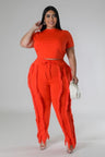 Plus Size model wearing orange High-Waist Pant Set