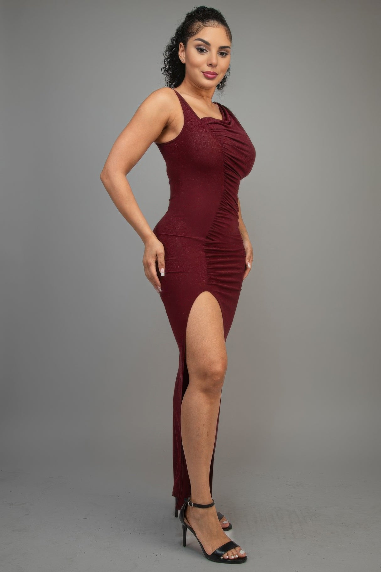 Burgundy one shoulder glitter maxi dress with front side slit side view