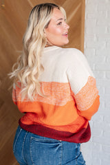 plus size Cozy & Bright different shades of Orange Stripe Color Block Sweater with Burgundy and Brown strips at the bottom back view