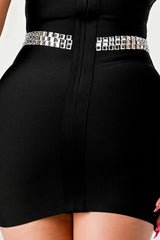 close up of the behind area of Black beaded detail tube mini dress