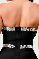 close of of the back zipper of Black beaded detail tube mini dress