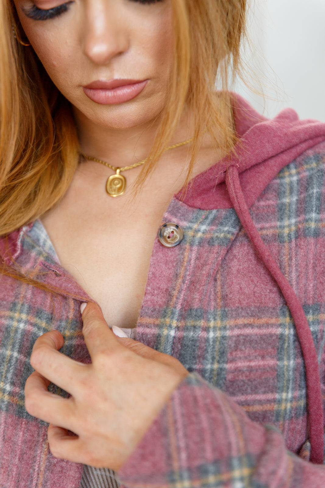 Red Plaid Hooded Shacket close up of button