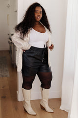 Black plus size faux leather shorts