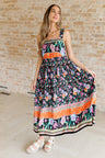 multi-color floral print maxi dress on a size small model