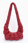 burgundy pleated faux leather crossbody bag with puffed-up handle