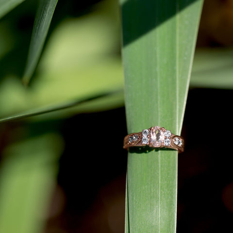 14 Karat Rose Gold Plated Morganite and White Topaz Ring on blade of grass