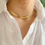 model wearing gold Herringbone Chain Necklace