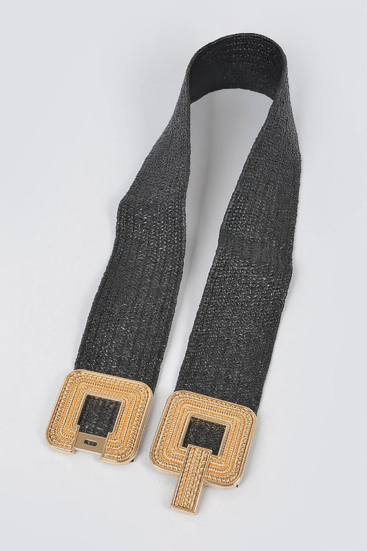 Black belt with gold buckle on a white background