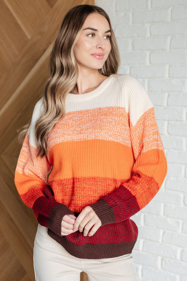 Cozy & Bright different shades of Orange Stripe Color Block Sweater with Burgundy and Brown strips at the bottom