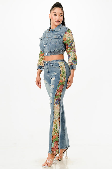 Woman wearing a floral-patterned denim outfit on a white background