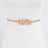 Gold belt with a knot design on a white mannequin.