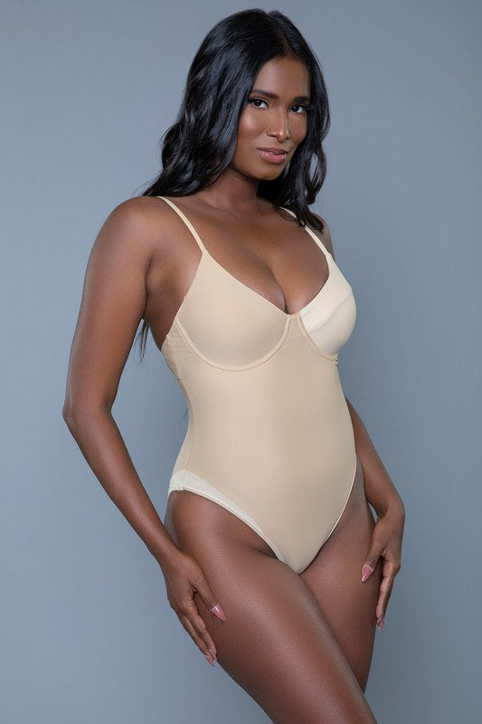 side view of Nude color Charlotte One Piece Swimsuit with color block padded cups, adjustable straps, back keyhole hook and eye closure and moderate bottom coverage