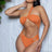 Orange one piece asymmetrical one shoulder one piece swimsuit with a padded bandeau top, front and back keyhole detail, high cut Brazilian bottom and sexy side cut out detail