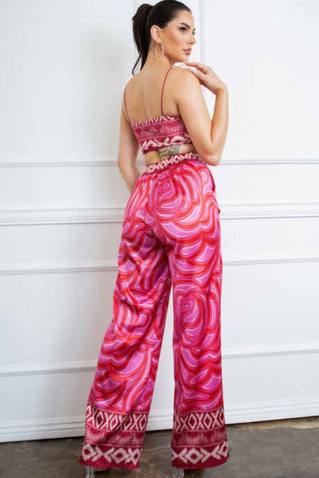 Pink with white and reddish\orange design Bra top and satin Wide leg pants set back view