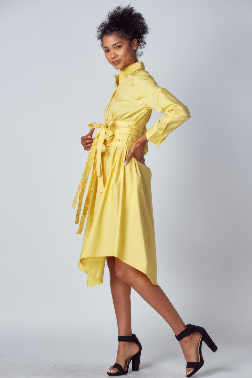 Yellow long sleeve dress with tie up detail side view
