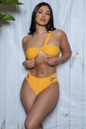 Yellow one piece asymmetrical one shoulder one piece swimsuit with a padded bandeau top, front and back keyhole detail, high cut Brazilian bottom and sexy side cut out detail