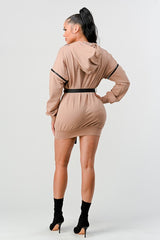 DOUBLE ZIPPER LONG SLEEVE HOODED MINI DRESS WITH AN ACCENT BELT + POCKET DETAILS. (SLEEVE ZIPPERS ARE DETACHABLE)