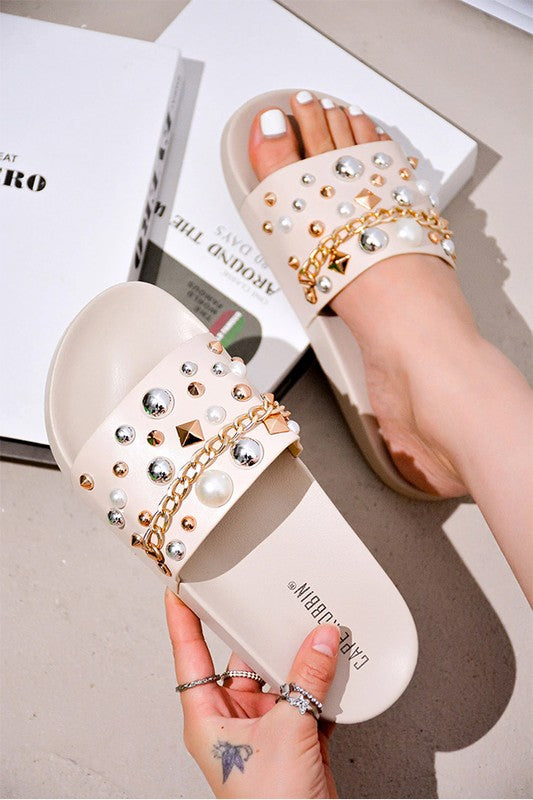 ivory colored bejewled slide sandals