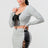 2 Piece Set with Cropped Long Sleeve Shirt with Pu Leather Detail and Crisscross Front Lace Up.  Matching Mini Skirt with Pu Leather Detail on Side with Crisscross Side Lace Up