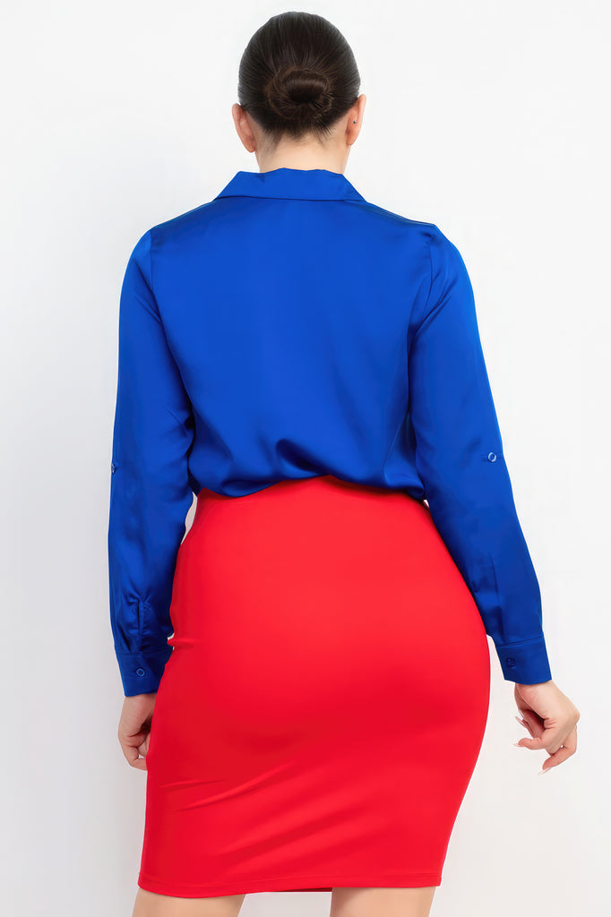 back view of model wearing royal blue Button-Down Pocketed Collared Top with an orange/red skirt
