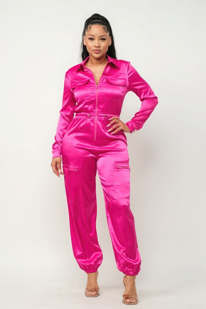 model wearing pink Zip Front Satin Cargo Jogger Jumpsuit