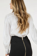 back view of model wearing Pearl Lace Trim Butt Down Blouse