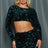 model wearing green Sequin Skirt Set