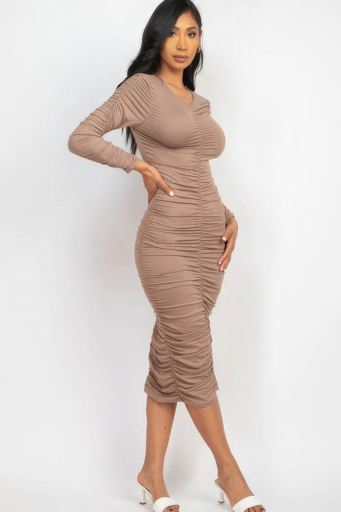 side view of model wearing taupe Long Sleeve Ruched Midi Dress