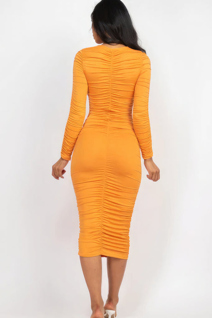 back view of model wearing yellow orange Long Sleeve Ruched Midi Dress