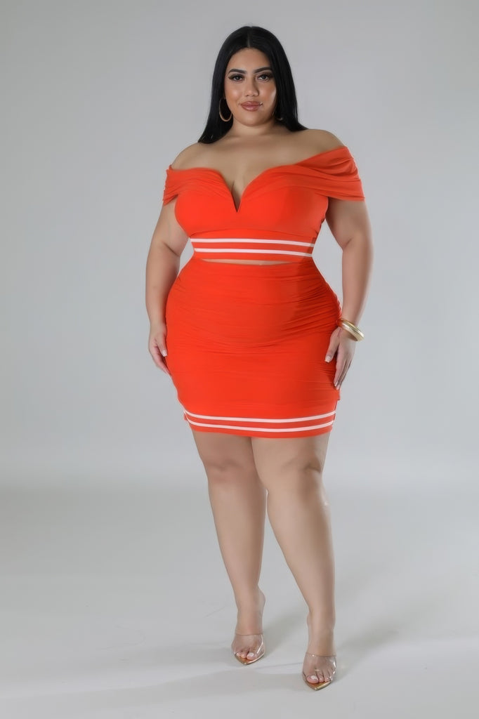 size 2X model wearing orange Plus Size Sweetheart Skirt Set